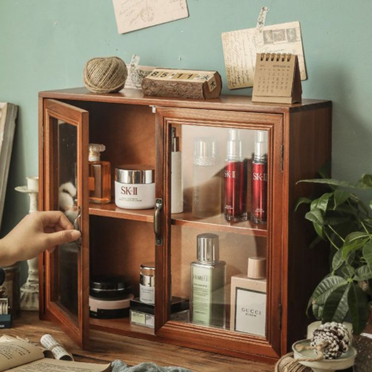 a wooden cabinet filled with personal care items