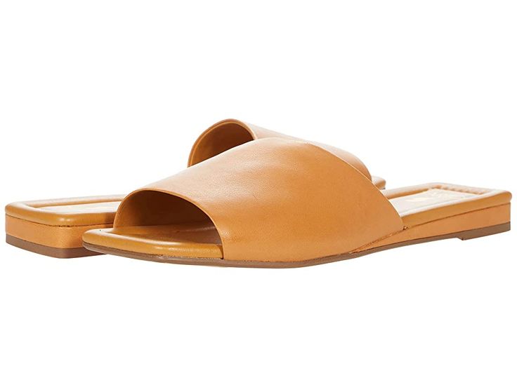 Franco Sarto Bordo by SARTO - Women's Shoes : Tan : The Franco Sarto® Bordo by SARTO is a trend-savvy style you'll want to wear every day. This slide sandal is crafted with a leather upper, and designed with a wide strap and a square toe. Slip-on styling. Man-made lining. Lightly padded footbed. Man-made sole. Imported. Measurements: Heel Height: 1 4 in Weight: 7 oz Product measurements were taken using size 8.5, width M. Please note that measurements may vary by size. Weight of footwear is base Classic Slip-on Slides For Summer, Classic Single Toe Strap Mules For Spring, Classic Spring Mules With Single Toe Strap, Modern Leather Slides For Spring, Summer Square Toe Mules With Leather Footbed, Modern Single Toe Strap Slides For Summer, Modern Summer Slides With Single Toe Strap, Modern Slides With Single Toe Strap For Summer, Chic Brown Slides With Leather Footbed