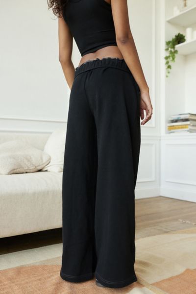 Wardrobe-staple sweatpants by Out From Under that you'll reach for again and again. Cut from fabric with an ultra-soft feel in a slouchy fit we love with a mid-rise and a baggy wide-leg. Finished with side-split hems. Find it exclusively at UO.Features. Out From Under sweatpants made to be lived in Relaxed slouchy fit Pull-on with easy side pockets UO exclusive Content + Care. 58% Cotton, 42% polyester Machine wash Imported Size + Fit. Model in Grey is 5'7" and wearing size Small Measurements ta Easy Sides, Split Hem, Ruffle Trim, Wardrobe Staples, Jogging, Mid Rise, Urban Outfitters, Fitness Models, Wide Leg