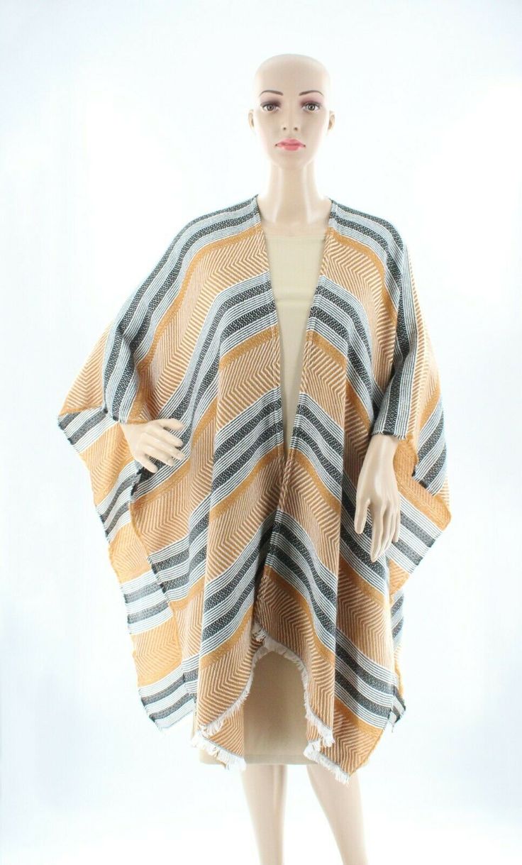 New Vince Camuto Chevron Weave Topper Ruana  Open Front Poncho Color: Spice Material: Acrylic Size: Regular- One Size Garment Measurements: 45" x 60" Mannequin measurements are:  Height: 69",Chest: 32",Waist: 24",Hip: 34" Brand new in package with tags Handwoven Fall Poncho Shawl, Sweater Ruana, Spring Vacation V-neck Poncho, Yellow Bohemian One-size Poncho, Bohemian One-size Woven Poncho, Open Front Poncho, Front Open, Vince Camuto, Vest Jacket