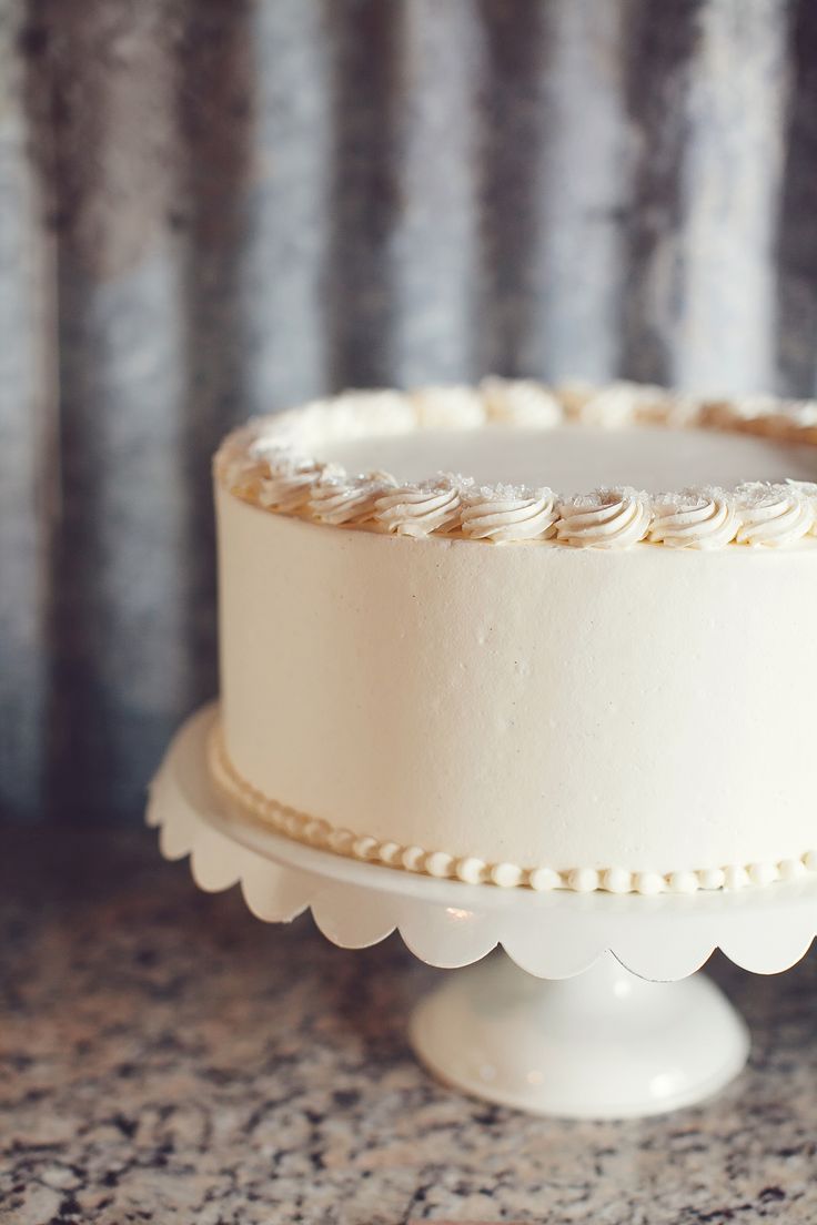 a white cake sitting on top of a table