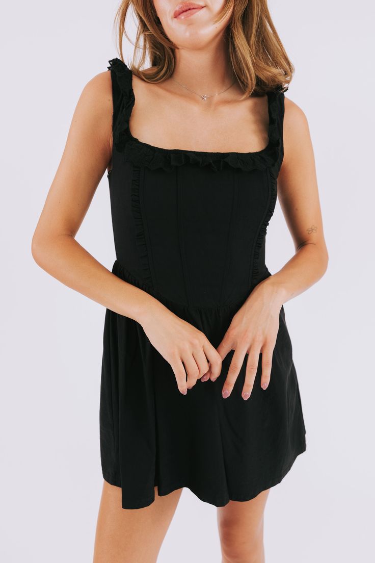 Get ready to make a statement with the Night Changes Dress. This black dress features stunning ruffles along the neckline and bodice, adding a touch of elegant flair. And with its cinched waist, mini length, and convenient side zipper, you'll feel comfortable and stylish all night long. It's the perfect choice for any special occasion! Details Black dress with ruffles accenting neckline and bodice Cinched waist Fully Lined Mini length Side zipper Sizing Approximate measurements: SIZE LENGTH BUST Chic Mini Dress With Gathered Neckline And Fitted Bodice, Square Neck Mini Dress With Ruffles For Night Out, Black Mini Dress With Ruffles And Fitted Bodice, Chic Mini Dress With Gathered Neckline For Date Night, Sleeveless Mini Dress With Gathered Neckline For Date Night, Black Fitted Dress With Ruffled Straps, Black Dress With Ruffled Straps For Night Out, Black Flirty Dress With Ruffled Straps, Black Dress With Ruffled Straps