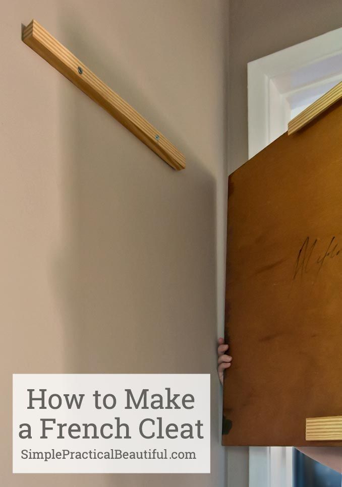 a person holding up a piece of wood with the words how to make a french cleat written on it