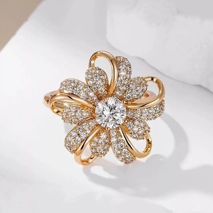 a gold ring with diamonds on it