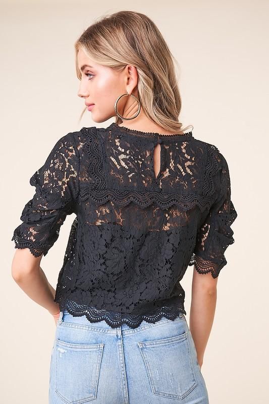 Add a touch of elegance to any outfit with the 'Romeo Romeo' balloon sleeve lace blouse! Dainty eyelash lace shapes a crew neckline, atop a contrasting crochet lace bodice framed by short, balloon sleeves. Cropped, scalloped hem finishes the flirty look. - Model is 5'9" and wearing size small. Available in black. 100% polyester. Imported. Short Balloon Sleeves, Lace Bodice, Scalloped Hem, Women Crop, Balloon Sleeves, Lace Blouse, Cotton Style, Black Blouse, Crochet Lace