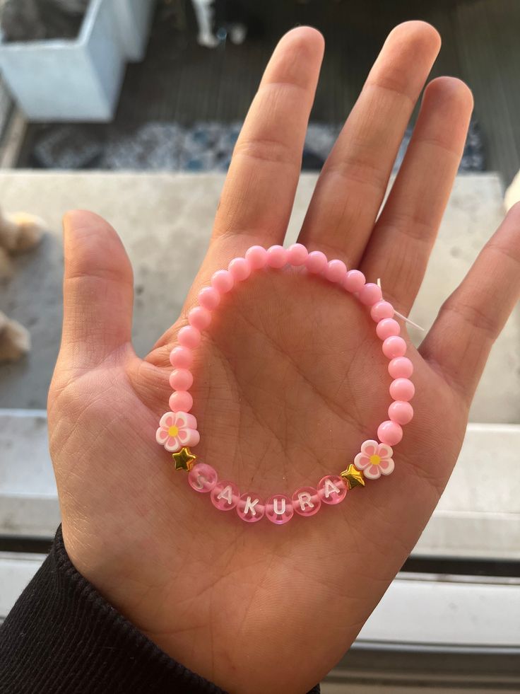 Handmade bracelet, with a sakura inscription in invisible pink letter. Width of approximately 16 centimeters! Pink Letter, Handmade Bracelet, Handmade Bracelets, Favorite Jewelry, Cute Art, Jewelry Bracelets, Handmade Items, Beaded Bracelets, Electronic Accessories