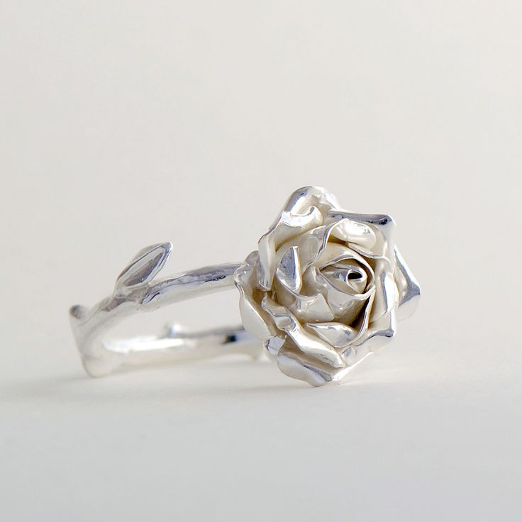 Sterling Silver Rose Ring, Handmade Silver Ring, Women Flower Ring This beautiful, delicate open rose ring would make a stunning statement piece. The band resembles the delicate stem of the rose and every ring is individually handmade so that no two pieces are exactly the same! This makes a truly special gift for yourself or a loved one. * Ring band Material: Sterling Silver * Size of Rose: Approx 1.5 cm (0.59in) diameter 0.6 cm (0.23 in) height * Ready to Ship in 2-4 business day * Made in the Elegant Adjustable Rose-colored Ring, Rose Gold Flower Design Promise Ring, Rose Design Flower Ring For Anniversary, Elegant Sterling Silver Rose Design Flower Ring, Silver Flower Jewelry For Proposal, Rose Gold Sterling Silver Open Flower Ring, Delicate Rose Gold Open Flower Ring, Elegant Rose Gold Flower Ring With Roses, Delicate Rose Gold Flower Ring