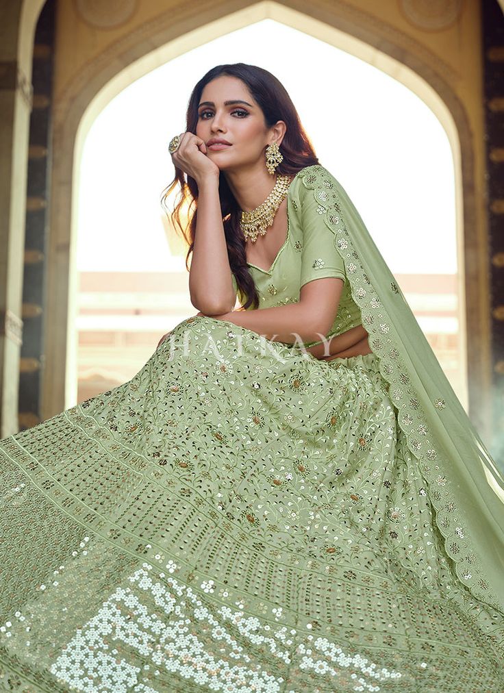 Pista Green Sequence Embroidered Wedding Lehenga Choli will make you look more beautiful on this wedding season with indian ethnic essence. This set comprises of traditional zari, resham and sequence embroidery work on silk georgette paired with all over equally embellished georgette lehenga with santoon lining and heavy can can. The beauty part is it’s minimalist embroidered georgette dupatta. Style this set with heels and golden jewellery to look stunning with all bridal drama. This set compri Collar Kurti Design, Collar Kurti, Golden Jewellery, Wedding Lehenga Choli, Pista Green, Sequence Embroidery, Georgette Lehenga, Georgette Dupatta, Net Lehenga