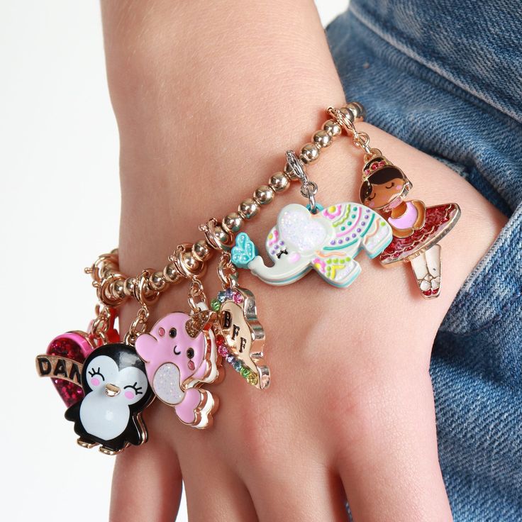 This Glitter Painted Elephant charm is a mini masterpiece! Add this charm to any CHARM IT! bracelet or necklace and customize her collection! features & materials Enamel, Glitter, Base Metal WARNING: Choking Hazard - Small parts. Not for children under 3 years. Charm It, Unicorn Charm, Food Charms, Elephant Painting, Heart Sunglasses, Elephant Charm, Locket Charms, Narwhal, Butterfly Charm