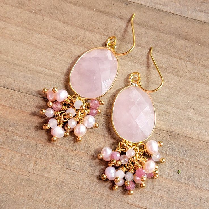 These beauties will adorn your ears with great elegance. Faceted rose quartz Facet pink Tourmaline gemstones Faceted pale blue Morganite gemstones Pink freshwater pearls 10k gold plate ear hooks 18k gold plate wire Length 2.5" Made in the USA Elegant Gemstone Beads Dangle Earrings, Pink Rose Quartz Earrings With Natural Stones, Elegant Dangle Earrings With Gemstone Beads, Elegant Gemstone Beads Earrings For Gift, Pink Teardrop Earrings With Natural Stones, Elegant Rose Quartz Gemstone Earrings, Elegant Rose Quartz Drop Earrings, Pink Natural Stones Wedding Earrings, Elegant Wedding Earrings With Gemstone Beads