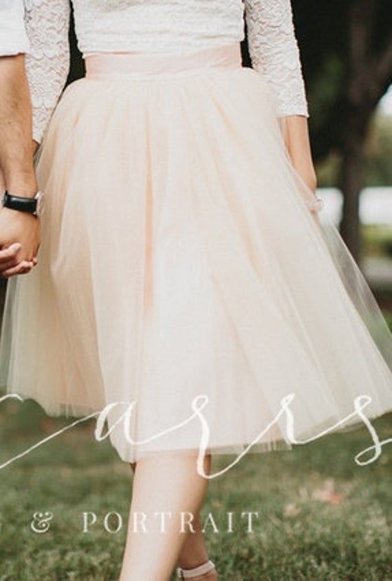 This Blush Tulle Skirt can be made in ANY color, ANY length, and ANY size and is the perfect Bridesmaid Dress or Wedding Skirt. The skirt is lined with a soft satin fabric of the same or contrasting color as the tulle. ALL ITEMS HANDMADE IN USA The satin waistband is flat with zipper and hook/eye closure in back. Elastic can be added to the back of the waistband, however only allows for a little wiggle room. This custom women's tulle skirt is perfect for any occasion and versatile enough to go f Spring Prom Long Skirt, Spring Long Skirt For Prom, Long Skirt For Spring Prom, Flowy Skirt For Prom In Spring, Spring Prom Lined Skirt, Spring Prom Skirt With Lining, Prom Tulle Long Skirt Bottoms, Spring Prom Ruffled Skirt, Fitted Tulle Pleated Midi Skirt