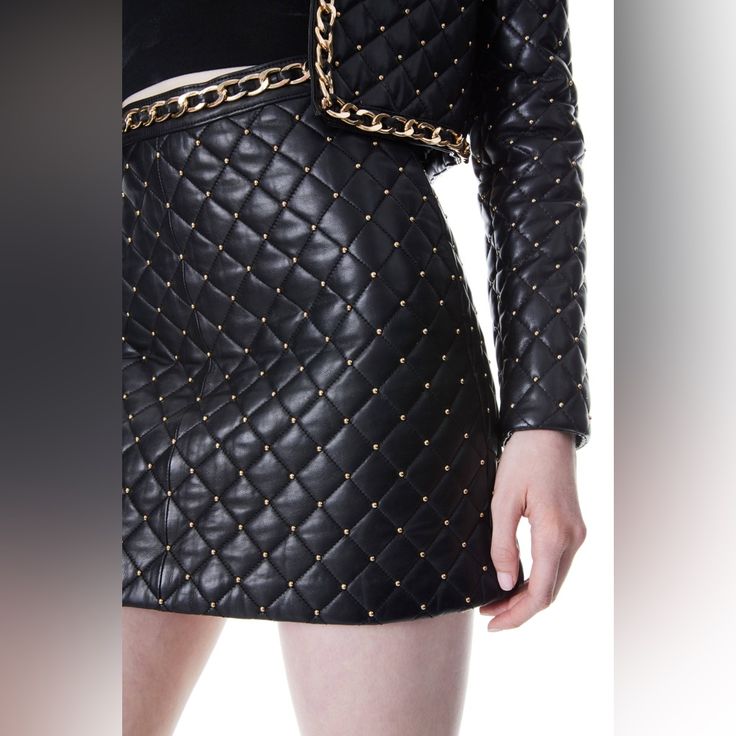 Riley Faux Leather Mini Skirt In Black Alice + Olivia Luxury Black Mini Skirt, Luxury Black Skirt For Night Out, Luxury Black Skirt For Work, Luxury Black Skirt For Fall, Luxury Black Leather Skirt, Ivory Pencil Skirt, Drop Waist Skirt, Asymmetrical Midi Skirt, Belted Mini Skirt