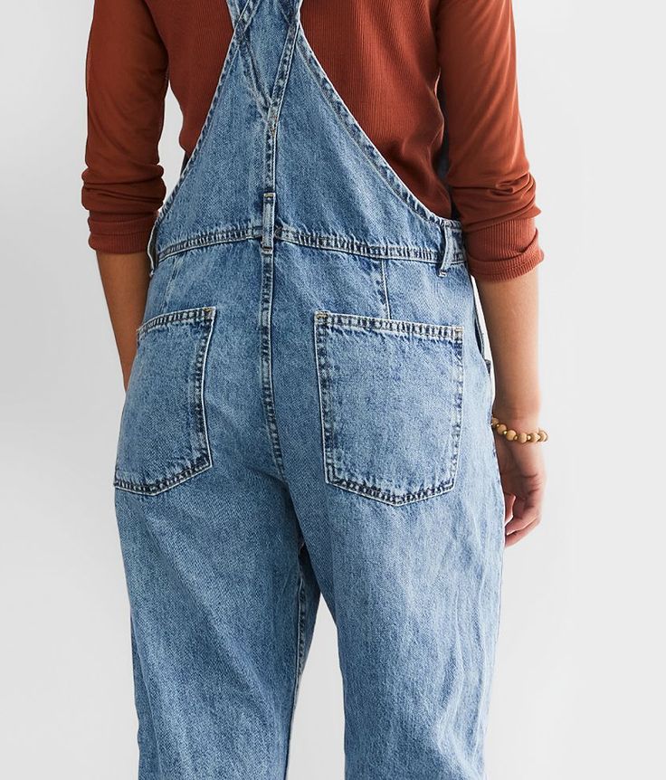 Free People Ziggy Denim Cuffed Overalls - Blue Large, Women's Powderblue 100% Cotton (Non-Stretch) - Rigid denim holds its shape and fades beautifully over time these overalls will be your go to for years to come. Finding the perfect size in these fits is all about your preference. For a bigger looser look you may want to size up or for a more fitted look order true to size. Relaxed fit overalls Faux fly Rise measures 11 1/2 Inseam measures 24 cuffed 29 uncuffed 15 bottom opening Adjustable stra Mid-rise Stonewashed Denim Bottoms, Mid-rise Medium Wash Denim Jumpsuit, Fall Medium Wash Stonewashed Bottoms, Medium Wash High Rise Washed Denim Jumpsuit, High Rise Medium Wash Denim Jumpsuit, Medium Wash Mid-rise Denim Jumpsuit, Straight Leg Denim Jumpsuit In Light Wash For Fall, Light Wash Stonewashed Denim Bottoms, Fall Light Wash Straight Leg Denim Jumpsuit