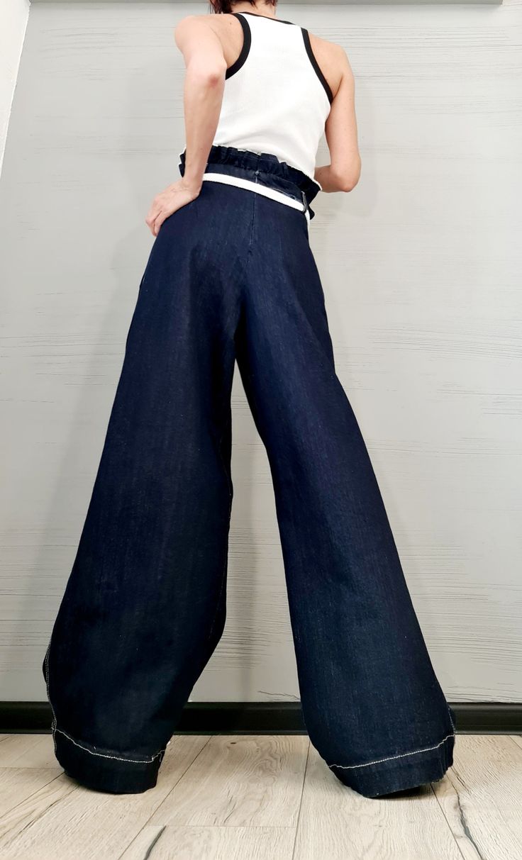 "New collection Denim Avant Garde Loose Pants, Harem Pants Women, Extravagant Denim Pants, Casual Pants, Punk Pants, Loose Pants ❤️ Extravagant designs and high quality fabrics! ❤️ Materials & Care Denim Hand wash at low temperatures. Do not machine dry. Do not iron. Do not dry clean! ❤️ Sizing We can make your piece from XS to 5XL! Everything in the shop can be also made according to your measures free of charge! ❤️ Shipping ✈ Ready to ship The time I need to prepare an order for shipping v Baggy Dark Wash Wide-leg Bottoms, Full Length Denim Blue Pants For Spring, Non-stretch Wide Leg Dark Wash Jeans, Chic Baggy Full-length Jeans, Chic Baggy Full Length Jeans, Fitted Wide-leg Denim Jeans, Elegant Denim Blue Bottoms With Pockets, Non-stretch Wide-leg Denim Blue Jeans, Chic Baggy Jeans