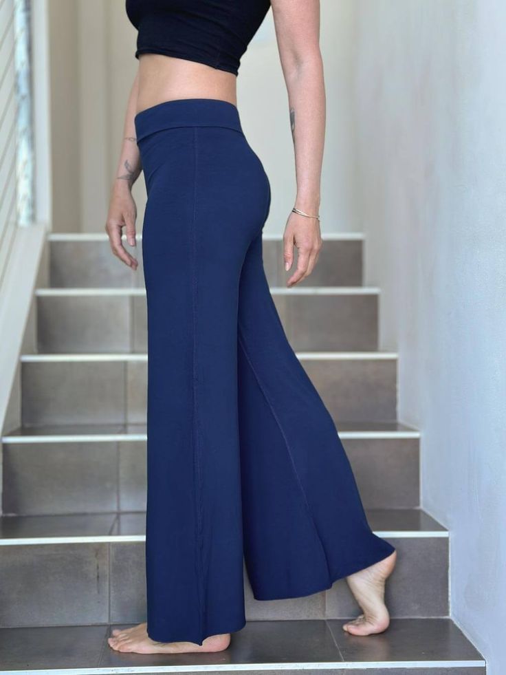 caraucci stretchy navy blue flare-leg pants #color_navy Full Length 4-way Stretch Pants For Loungewear, Chic Wide-leg Yoga Pants, Flare Bottoms With Elastic Waistband For Loungewear, Fitted Full Length Dress Pants With Elastic Waistband, Versatile Full-length Loungewear Pants, Versatile Loungewear Pants, Versatile Full-length Elastane Yoga Pants, Solid Flare Bottoms With Elastic Waistband, Wide-leg 4-way Stretch Loungewear Pants