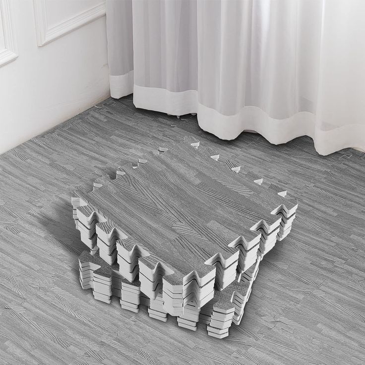 the floor is made out of books and has been placed on top of each other