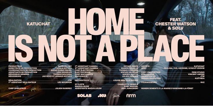 a poster with the words home is not a place on it's front window