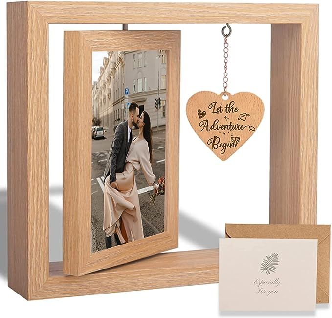 a wooden photo frame with a heart hanging from it