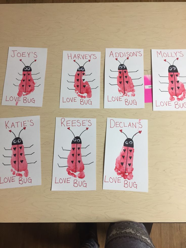 ladybug valentine's day cards are displayed on a table