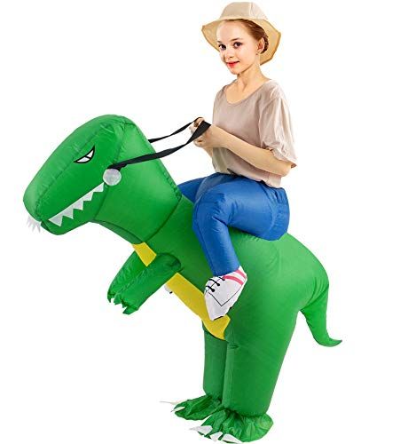 a woman riding on the back of an inflatable dinosaur costume with a stethoscope