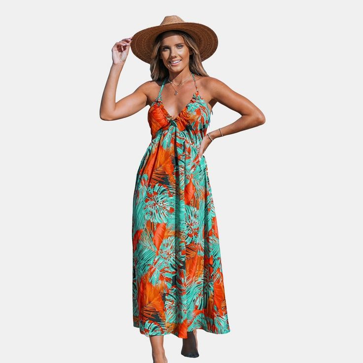 Unleash your vibrant spirit with our Tropical Floral Sleeveless Halter Maxi Dress. The playful tropical florals dance across the fabric, creating a lively and eye-catching ensemble. With a chic halter neckline and a flowing maxi length, this dress is a perfect balance of style and comfort. Product code: CAA05A4A038SJ/CAA05A4C090RK Multicolor Tropical Print Maxi Dress For Summer, Vibrant Green Tropical Print Maxi Dress, Summer Multicolor Print Sundress For Beach, Summer Sundress In Multicolor Print For Beach, Summer Multicolor Print Beach Sundress, Summer Multicolor Sundress For Beach, Summer Multicolor Print Sundress For The Beach, Vibrant Sleeveless Maxi Dress With Vibrant Print, Sleeveless Printed Sundress For Beach Party