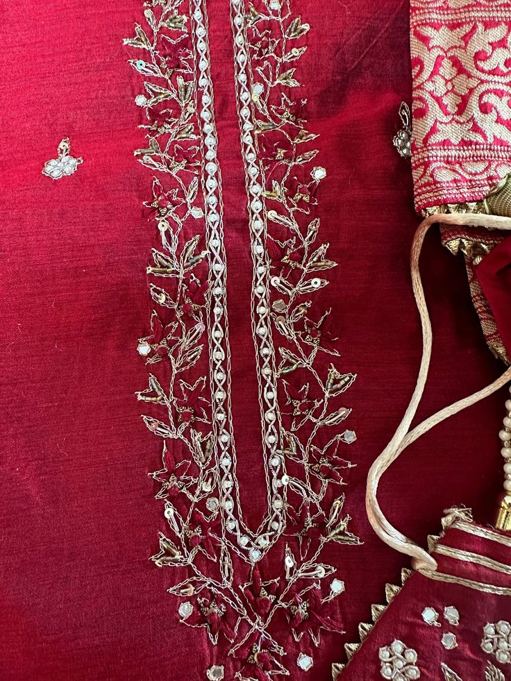 Shirt: Chanderi Silk- Embroidered Neck/ 2.5 Mts Beautiful Hand Embroidery * Dupatta:Banarasi Georgette Dupatta/Stone all over/4 Side trims/ Latkan tassels * Bottom Santoon Silk 2.5 Mts. Excusive Hand Embroidered Party Wear Punjabi Suit. Festive Unstitched Suit With Dabka Work And Straight Kurta, Unstitched Straight Kurta With Dabka Work For Festive, Elegant Red Chanderi Lawn Suit, Bollywood Red Lawn Suit For Wedding, Embroidered Semi-stitched Slub Silk Salwar Kameez, Designer Nida Kurta With Resham Embroidery, Unstitched Slub Silk Kurta With Embroidery, Unstitched Slub Silk Suit With Resham Embroidery For Navratri, Traditional Raw Silk Lawn Suit With Dabka Work