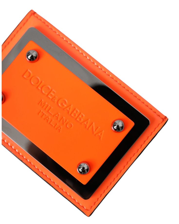 Dolce & Gabbana card holder wallet Calfskin material 3D-effect Dolce & Gabbana Milano logo on tag Made in Italy Orange and black color Measurements: 10cm x 7.5cm x 1cm Size on Tag: One Size Black Rectangular Card Holder With Logo Plaque, Designer Rectangular Card Holder With Logo, Designer Compact Card Holder With Card Slots, Designer Rectangular Wallet With Embossed Logo, Designer Wallet With Embossed Logo, Designer Wallets With Embossed Logo, Luxury Rectangular Wallet With Logo, Designer Rectangular Wallets With Logo, Luxury Rectangular Wallets With Logo