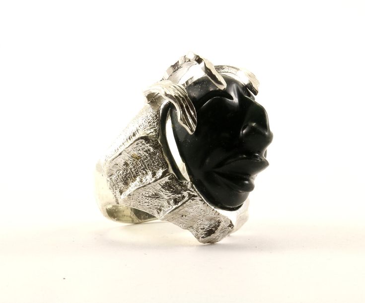 This is Vintage Beautiful Large Goddess God Face Black Stone Design Ring Condition: Vintage Metal: Sterling (.925) Silver Weight: 27.4 grams Size: 6 Images you see are actual pictures of jewelry you will receive Every purchase comes thoughtfully packaged and ships within 1 business day New York State buyer will be charged sales tax Feel free to contact us with any questions. We are open Mon-Fri 9-5 EST We appreciate your business Sparkly Ring, Vintage Band, Stone Design, Great Bands, Black Stone, Ring Collections, Vintage Metal, Ring Designs, Band Rings