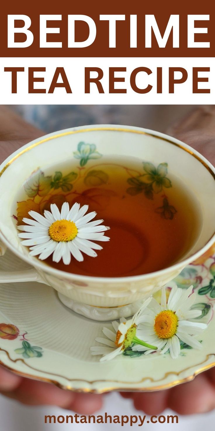 a cup of tea with daisies in it and the words bedtime tea recipe