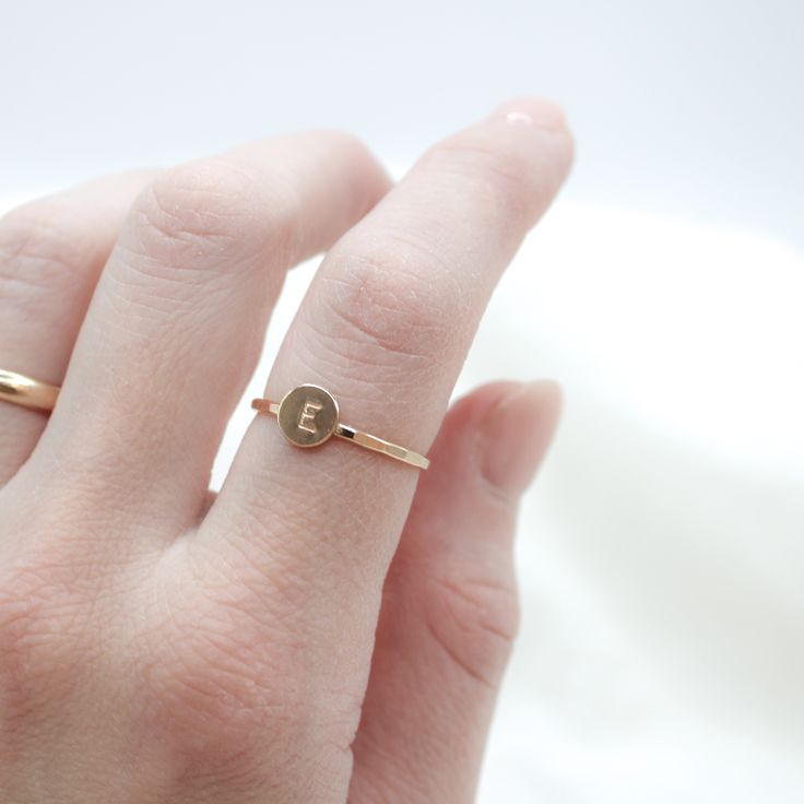 initial is set on a Hammered Band Circle: 6.4mmBand Width: 1.3mm Processing Time: 1-2 Weeks Handmade by Amanda Michelle Stacker Rings, Hammered Band, Initial Ring, Ring Sizer, Cute Rings, Earring Necklace, Ring Earrings, Bridal Jewelry, Necklaces Bracelets