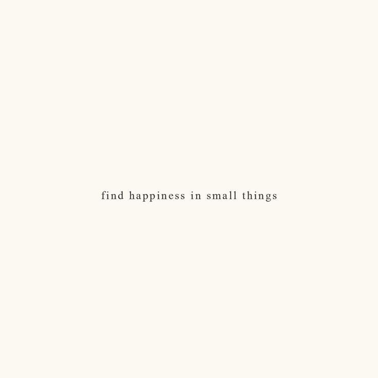 the words find happiness in small things are written on white paper with black ink against a plain background