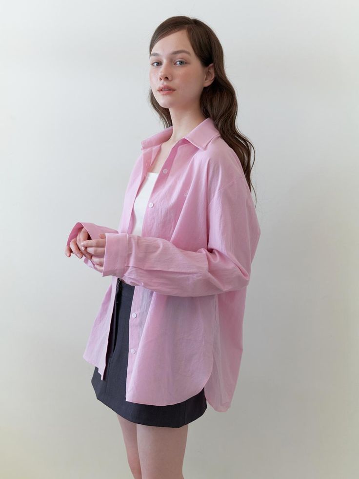 This is a minimal and unique shirt by KINDABABY that is made out of high quality and sturdy fabric. With trendy design detail and feminine mood, you can style it for your daily casual outfit.- Embroidery logo detail- Oversized silhouette and basic design- Light cotton fabric with casual mood Pink Shirt For Workwear In Summer, Pink Oversized Long Sleeve Shirt, Casual Pink Tops For Work, Pink Summer Workwear Shirt, Chic Pink Cotton Shirt, Pink Relaxed Fit Feminine Shirt, Casual Pink Shirt For Work, Cotton Shirt With Shirttail Hem, Casual Pink Workwear Shirt