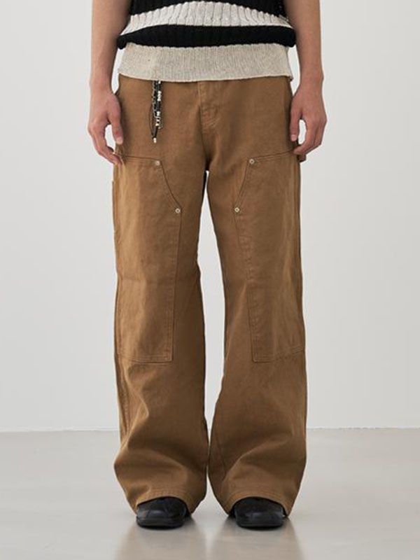 This is a casual and comfortable pants by BASEMOMENT that is made out of high quality and sturdy fabric. With minimal design detail and trendy mood, you can style it for your casual and young daily outfit.- Bio washed cotton 100% fabric- Double knee patch detail on the front- YKK zipper closure- Wide silhouette Brown Straight Leg Cotton Chinos, Brown Cotton Straight Leg Chinos, Urban Style Cotton Cargo Pants For Spring, Beige Cotton Utility Work Pants, Beige Five Pocket Pants For Streetwear, Beige Five-pocket Pants For Streetwear, Beige Streetwear Pants With Five Pockets, Spring Urban Style Cotton Cargo Pants, Spring Urban Cotton Cargo Pants