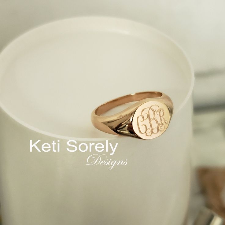 "Personalized signet ring with monogram initials in precious metal s of your choice. Hand engraved round disc ring with your initials etched into the metal. Ring can be crafted in 10K Gold, 14K gold or 18K Gold. Order any initials and they will be hand engraved by our talented jewelers. Design by Keti Sorely. Metal options: - 10K Gold (Yellow, Rose or White) - 14K Gold (Yellow, Rose or White) - 18K Gold (Yellow, Rose or White) Ring disc measures approximately 1/2\" wide (13-14mm). Ring sizes ava Personalized Heirloom Rose Gold Initial Ring, Engraved Initial Ring In Rose Gold, Engraved Rose Gold Initial Ring In Fine Jewelry Style, Engraved Rose Gold Initial Ring, Luxury Rose Gold Initial Ring, Elegant Rose Gold Initial Ring With Engraving Option, Personalized Heirloom Rose Gold Signet Ring, Personalized Luxury Rose Gold Initial Ring, Luxury Personalized Rose Gold Initial Ring