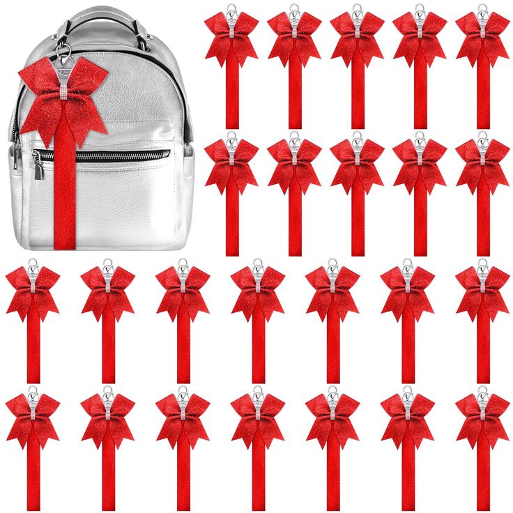 a bunch of red bows tied to the side of a backpack