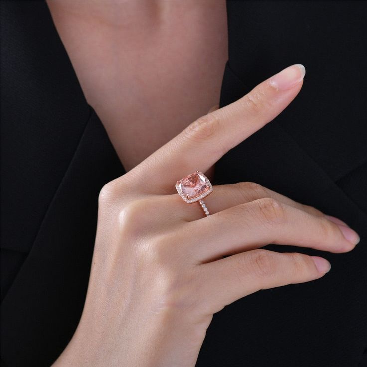 For just one small piece of jewelry, this Morgan ring packs a lot of incredible detail. The rose gold-tone plated setting is the perfect base for a square of pink stone. The rosa gemstone is gracefully held in place and adorned with little sparkling white zirconia, to deliver a gorgeous overall colorway. Handcrafted premium-grade square-cut 5A high carbon cubic zirconia gemstone 925 Sterling Silver - Hypoallergenic and durable 5-Carat Gemstone Weight: 2.9 g Stone Size: 10*10 mm Formal Rose Gold Morganite Diamond Ring, Fine Jewelry Morganite Diamond Ring In Rose Gold, Fine Jewelry Rose Gold Morganite Diamond Ring, Rose Gold Topaz Ring With Morganite And Accent Stones, Rose Gold Rings With Diamond Accents And Morganite, Elegant Rose Gold Topaz Ring With Diamond Accents, Elegant Rose Gold Topaz Ring With Accent Stones, Elegant Rose Gold Diamond Ring With Accent Stones, Rose Gold Cushion Cut Morganite Ring