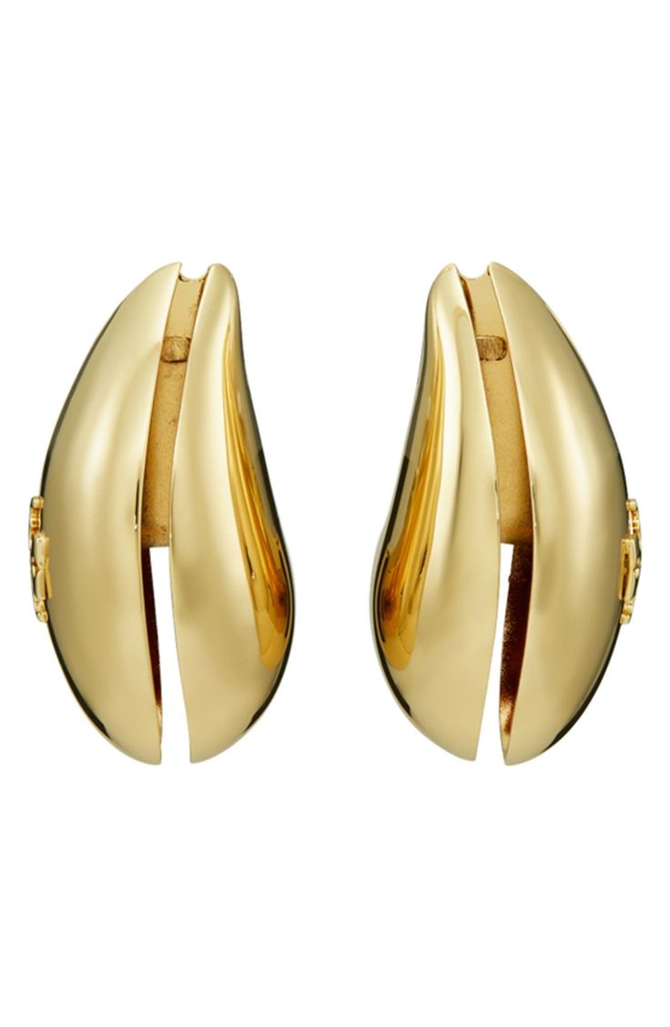 Grooved wave clip-on earrings offer sophisticated shine with an embossed logo and highly polished finish. 3/4"W x 1 3/4"L Clip-on style Goldtone or silvertone plate Imported Luxury Polished Clip-on Earrings For Evening, Luxury Polished Finish Clip-on Earrings For Evening, Designer Formal Earrings With Polished Finish, Designer Polished Finish Earrings For Formal Occasions, Modern Polished Clip-on Earrings For Evening, Designer Polished Finish Earrings For Evening, Luxury Polished Clip-on Earrings For Formal Occasions, Modern Yellow Gold Clip-on Earrings With Polished Finish, Embossed Logo