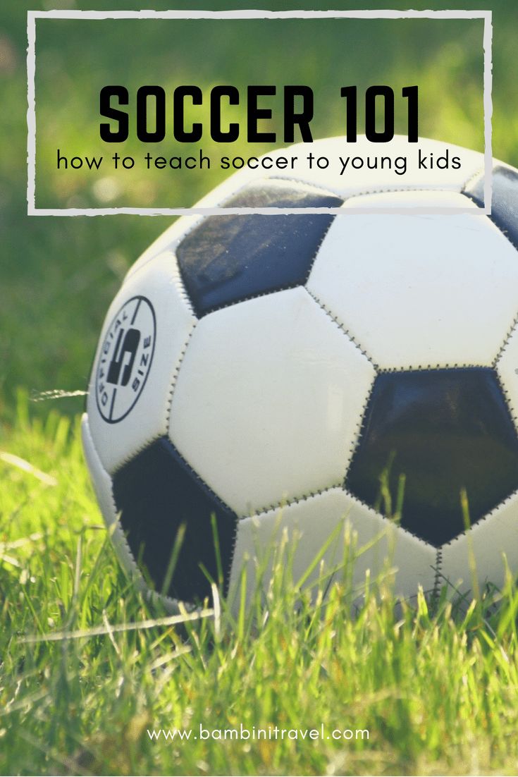 a soccer ball sitting in the grass with text overlay reading soccer 101 how to teach soccer to young kids