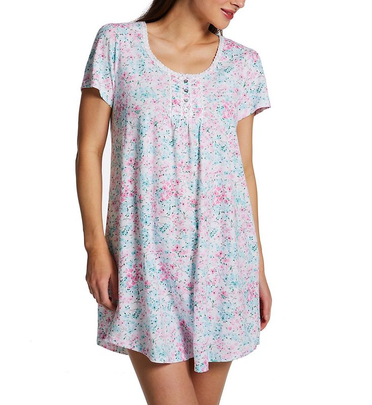 Cute short nightshirt with delightful floral prints, wonderful details, and pure cotton comfort. Wide rounded neckline with applique border sewn onto front edge. Decorative ruched button panel with applique, small satin bow at top, and four polished genuine shell flower-shaped buttons. Interior of button panel is lined with fine mesh for comfortable contact with skin. Short cap-style sleeves with ruching at shoulder. Fit flares slightly to curved hem. Tag sewn inside of back can be used as a han Comfortable Cotton Nightgown For Spring, Cotton Relaxed Fit Nightgown For Spring, Casual Cotton Nightgown For Summer, Casual Cotton Nightgown With Floral Print, Cotton Sleepwear With Floral Print And Short Sleeves, Summer Cotton Floral Print Nightgown, Casual Cotton Nightgown Relaxed Fit, Casual Cotton Nightgown With Relaxed Fit, Summer Floral Cotton Nightgown