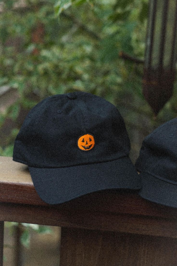 Inspired by the simple pumpkin designs of 90's Halloween info: 6 panel baseball cap (Dad Hat), adjustable sizing Black Six-panel Fall Hat, Casual Halloween Cap, Casual Halloween Baseball Cap With Curved Brim, Halloween Black Snapback Baseball Cap, Black Halloween Snapback Baseball Cap, Casual Adjustable Baseball Cap For Halloween, Black Snapback Baseball Cap For Halloween, Halloween Snapback Baseball Cap For Streetwear, Fall Streetwear Baseball Cap