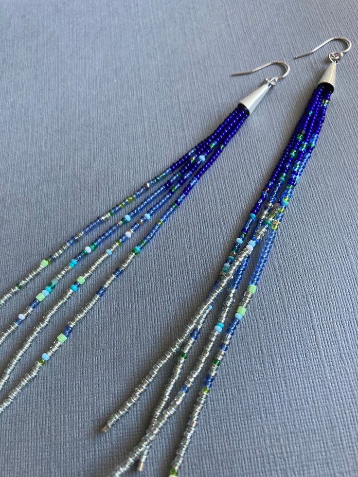 Silver and Blue Seed Beads 4 6 and 9 - Etsy Blue Dangle Beaded Necklace With Tiny Beads, Blue Multi-strand Jewelry With Dangling Beads, Handmade Blue Beaded Earrings For Beach, Blue Bohemian Beaded Dangle Earrings, Blue Spacer Beads For Festivals, Blue Large Beaded Dangle Earrings, Blue Large Beads Dangle Earrings, Blue Beaded Earrings With Dangling Beads For Festival, Blue Beaded Dangling Earrings For Festivals