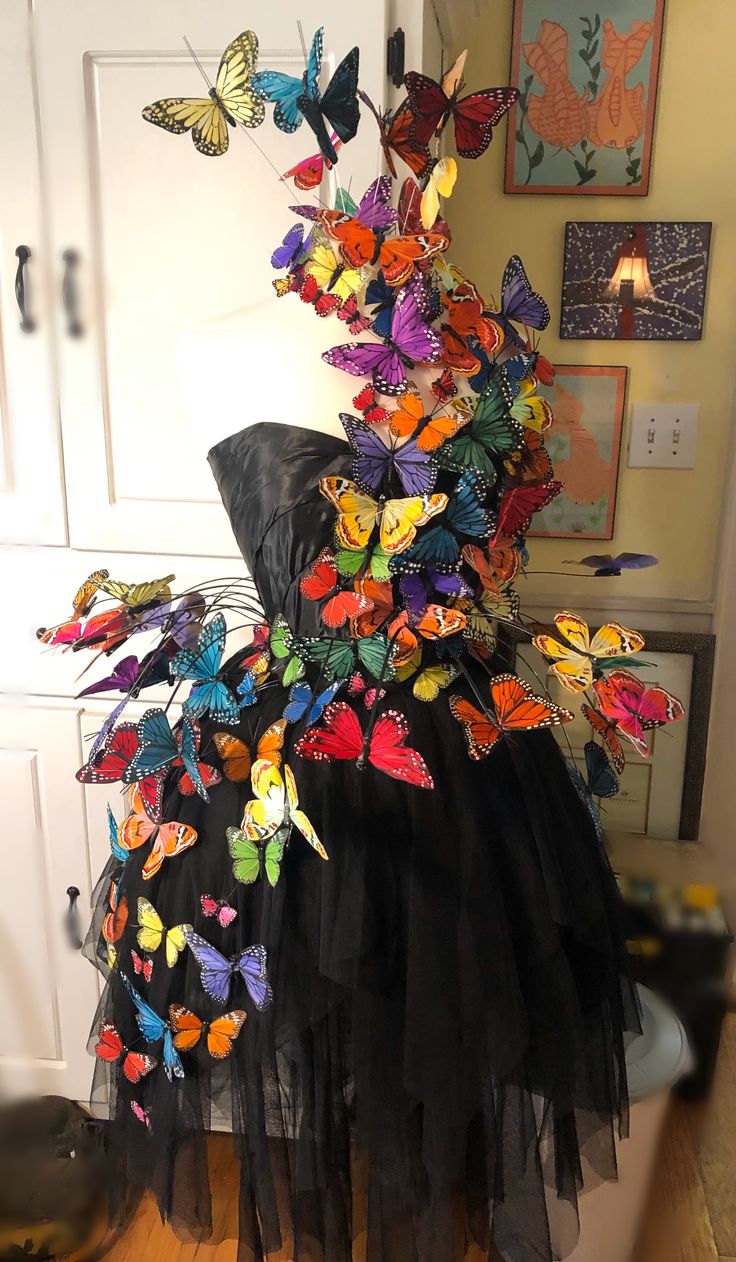 there is a dress made out of butterflies