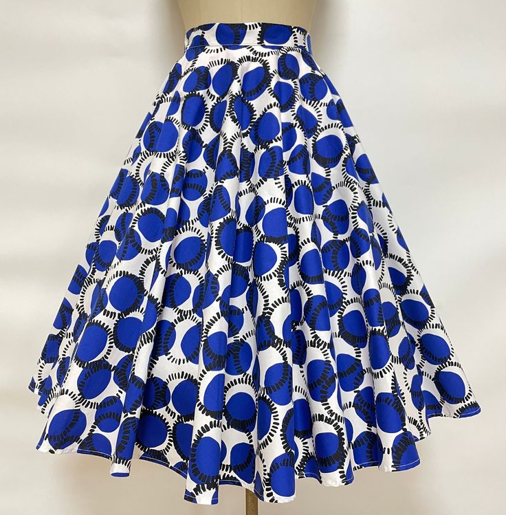 1950s style Full Circle Skirt Details: * Quality Cotton with spandex * Two side pockets * Standard Knee Length  from waist to Hem  28 inch approx Sizes -------Waist (inch） 00        --     24           0          ---    25            2           --     26              4           --    27          6          --     28            8          --     29          10         --    30           12        --     31.5 14          ---   33 16          ---   35.5 18          ---   38 20        ---   40.5 2 Retro Fitted Skirt Bottoms, Retro Flared Skirt With Pockets, Retro Fitted Skirt, Retro Fitted Lined Skirt, Retro Fitted Midi Skirt, Retro High Waist Stretch Skirt, Retro A-line Cotton Bottoms, Retro Pleated Mini Skirt, High Waist Retro Pleated Skirt