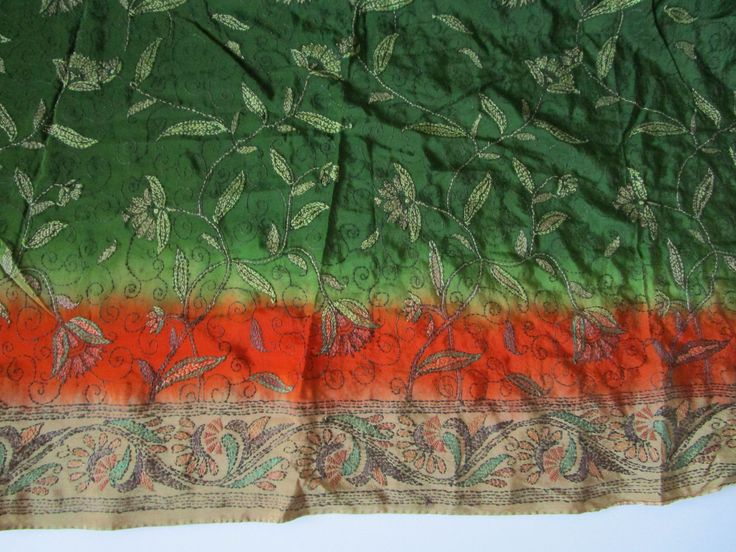 This is a beautiful Vintage Hand Embroidered Silk Saree. The colors are Green, Orange, Beige. Botanical, Floral Pattern Sari. Boho, Bohemian Party Wear, Wedding Sari. The Saree is 6 Meters Long. I have training in sewing and to me it looks like this whole 6 meters long fabric has been hand embroidered. That is very amazing. I can not start understanding how many hours it took to make. This item can be used as traditional a Sari or for home decor and sewing and craft projects. In my opinion it wo Green Embroidered Bohemian Shawl, Bohemian Wedding Blouse Piece With Resham Embroidery, Bohemian Wedding Blouse With Resham Embroidery, Bohemian Green Lehenga With Floral Embroidery, Bohemian Orange Choli For Wedding, Bohemian Green Lehenga With Intricate Embroidery, Orange Bohemian Dupatta For Eid, Bohemian Style Wedding Blouse Piece With Multicolor Embroidery, Bohemian Orange Dupatta For Eid