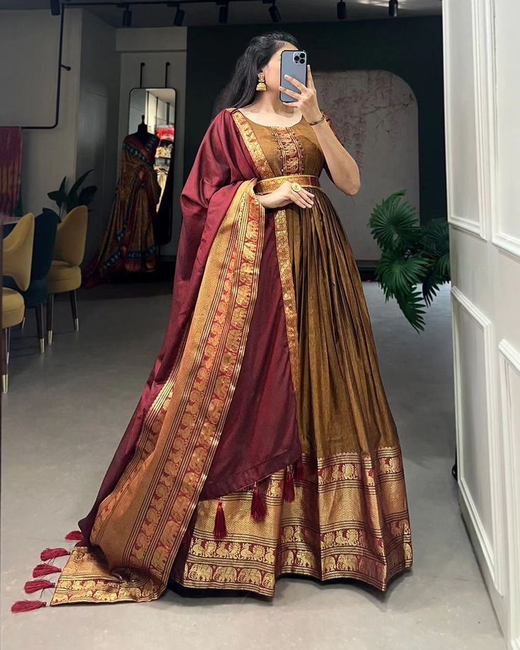 #trending 🌷Gown Collection🌷 Rate : 1299/- | DM US FOR ORDER 7997018094 | COD - YES Have your self this traditional narayanpet gown to give your function more ethnic vibe *Gown* Gown Fabric : Narayan pet (cotton) Gown Work : Zari weaving work Gown Chest : (40)" (Inside 2 inch extra margin available so you can adjust up 38 to 42 for your body comfort ) Stitching : Stitched With Canvas Gown Waist : 38" Gown Length : 57 Sleeve length : 11 Shoulder : 15 Flair : 3.50 Meter Lining : silk (full... Long Gown With Dupatta, Dress With Dupatta, Traditional Gowns, Gown With Dupatta, Reception Lehenga, Party Wear Gown, Bollywood Lehenga, Cotton Gowns, Exquisite Gowns