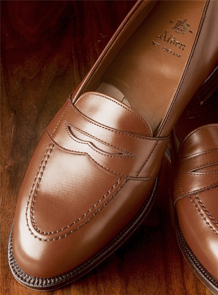 Classic Cognac Leather Slip-on Shoes, Classic Cognac Slip-on Moccasins, Classic Cognac Moc Toe Loafers, Classic Cognac Loafers For Business Casual, Classic Cognac Leather Loafers, Classic Cognac Loafers For Formal Occasions, Elegant Loafers With Leather Sole In Cognac, Elegant Cognac Loafers With Leather Sole, Elegant Cognac Moc Toe Loafers