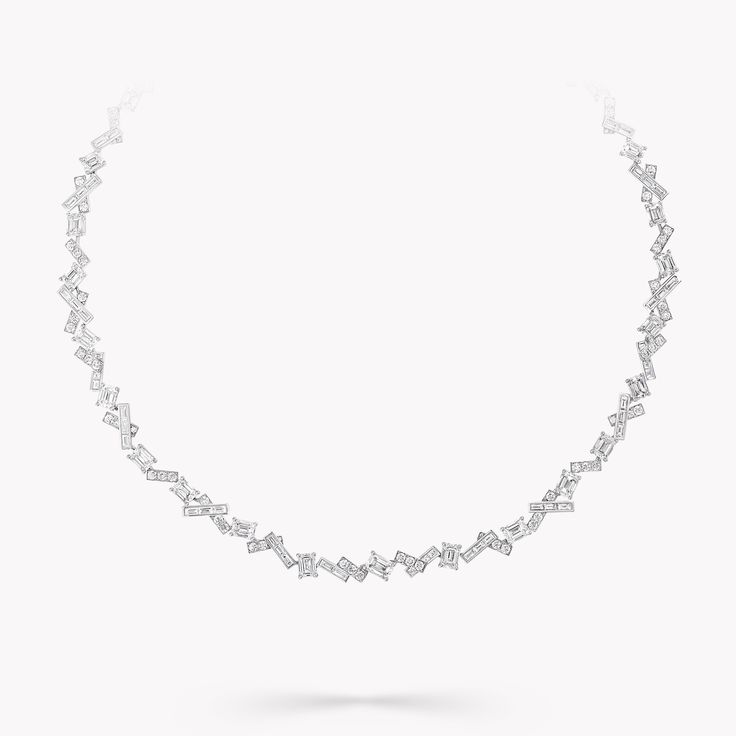 Contemporary yet timeless, our white gold Threads necklace features an abstract arrangement of custom cut baguette cut and pavé diamonds, set to form interconnected threads of brilliance. Combining spontaneity with geometry, the Threads collection interprets the invisible connections that unite us all in jewels that range from delicate diamond earrings, pendants, necklaces and bracelets to geometric masterpieces set with vibrant yellow diamonds. A contemporary Threads baguette cut and round diam Graff Diamond Necklace, Graff Necklace, Graff Jewelry, Graff Diamonds, Bvlgari Jewelry, The Bling Ring, Perhiasan India, Delicate Necklaces, Thread Necklace