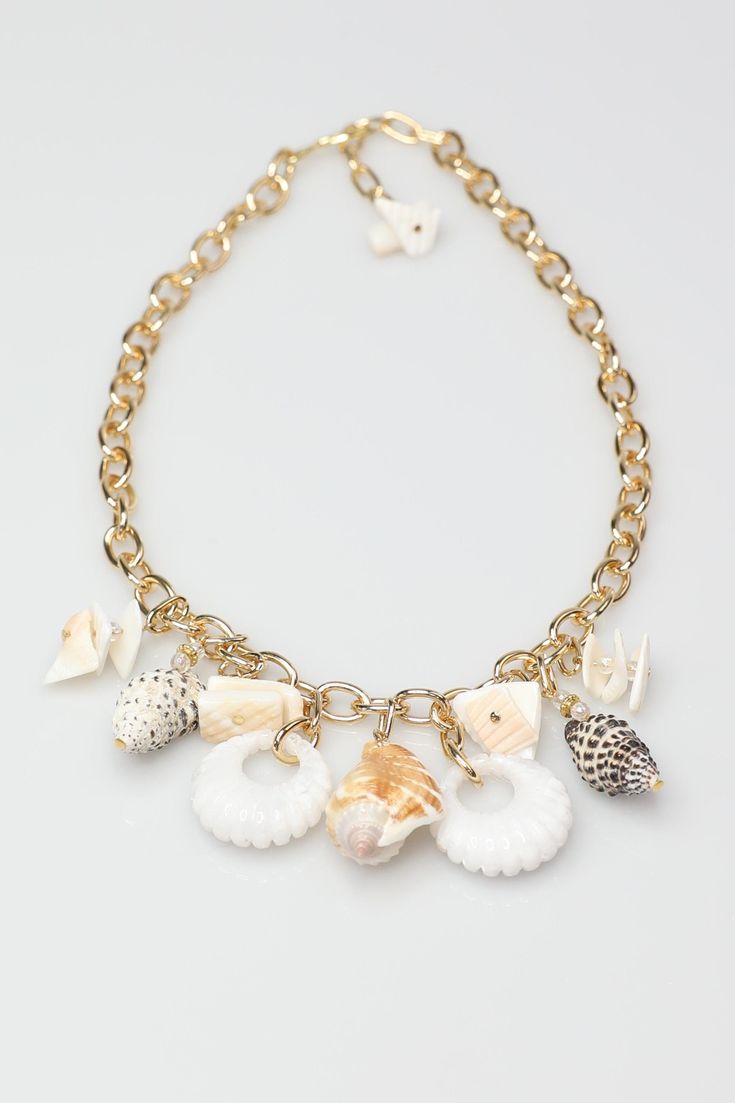 Handmade Shell Necklace Cheap Handmade Casual Shell Necklace, Cheap Handmade Shell Necklace, Fashion Show Jewelry, Handmade Beachy Necklace For Beach Party, Ocean-inspired Strand Necklaces For Vacation, Ocean-inspired Shell Necklace, Ocean-inspired Shell Necklace With Lobster Clasp, Beachy Shell Necklaces For Summer, Summer Shell Jewelry For Vacation