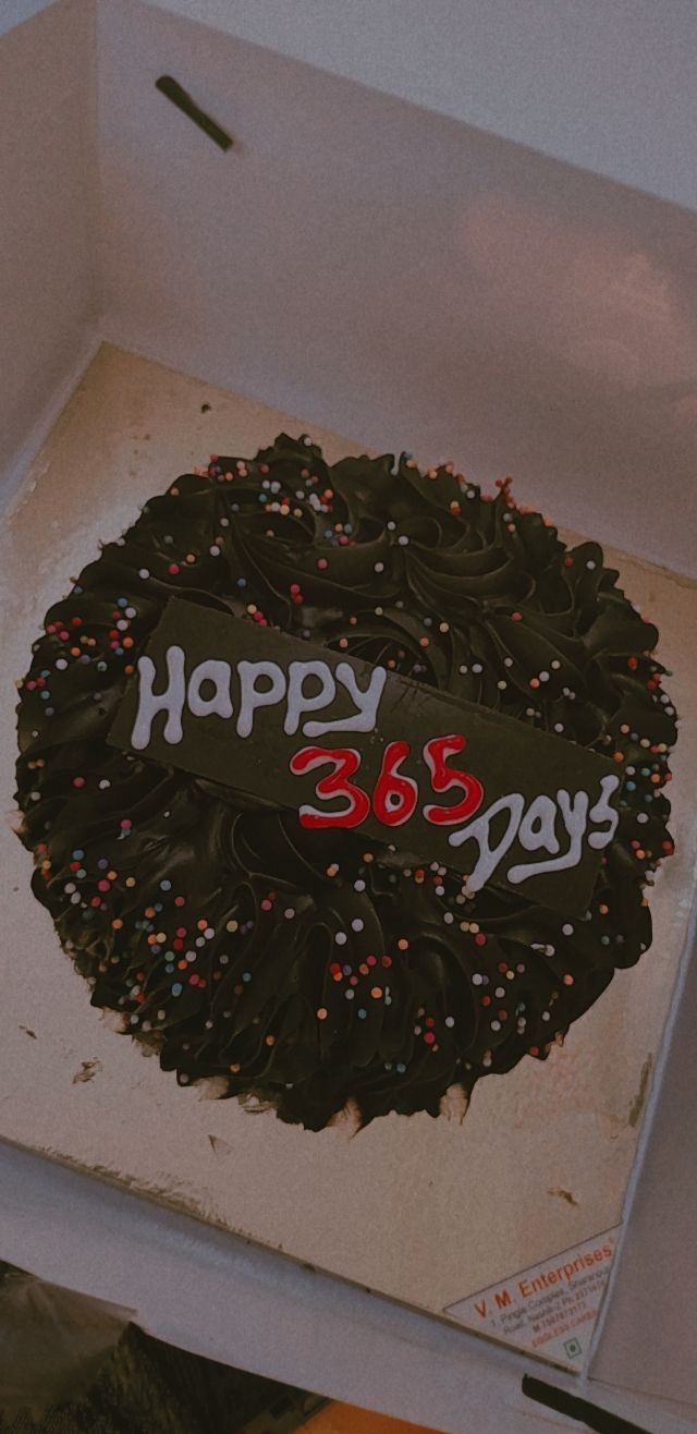 a birthday cake in a box with the number 35 on it