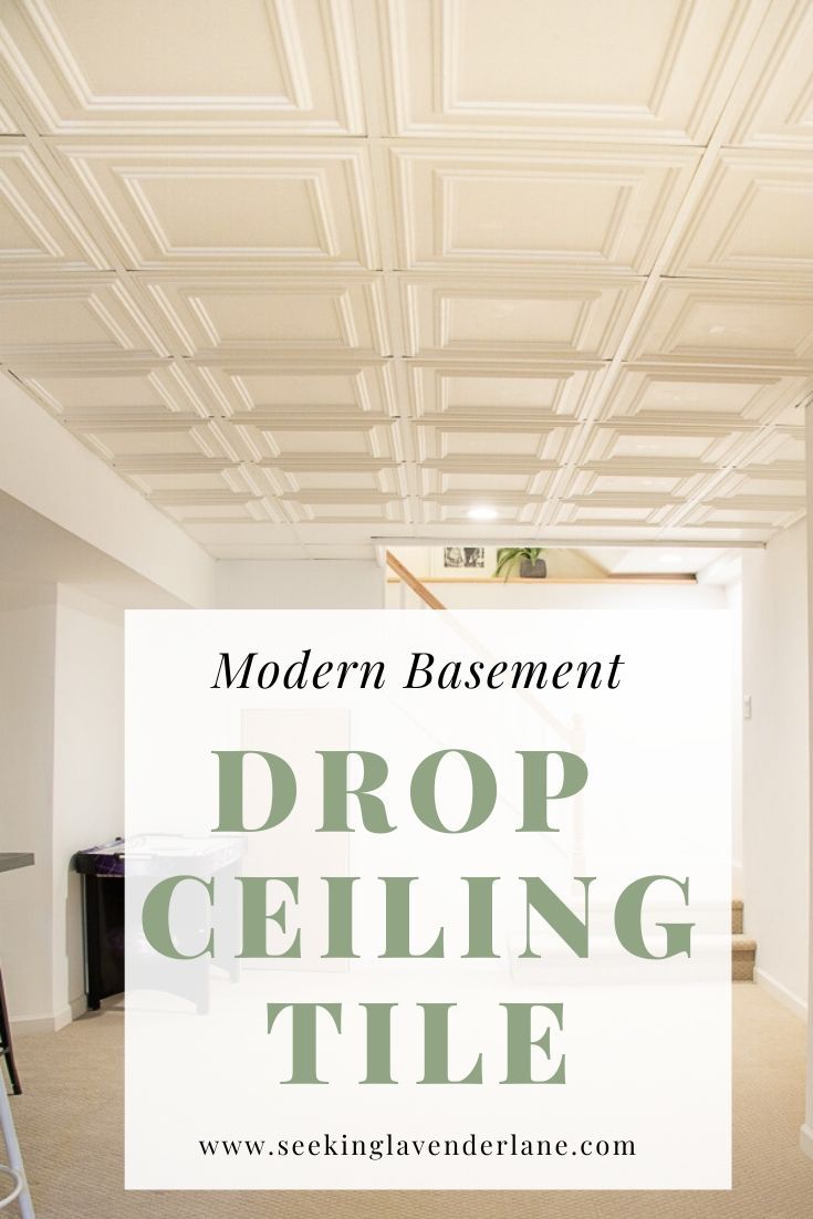 an empty room with the words modern basement drop ceiling tile on it and ladders